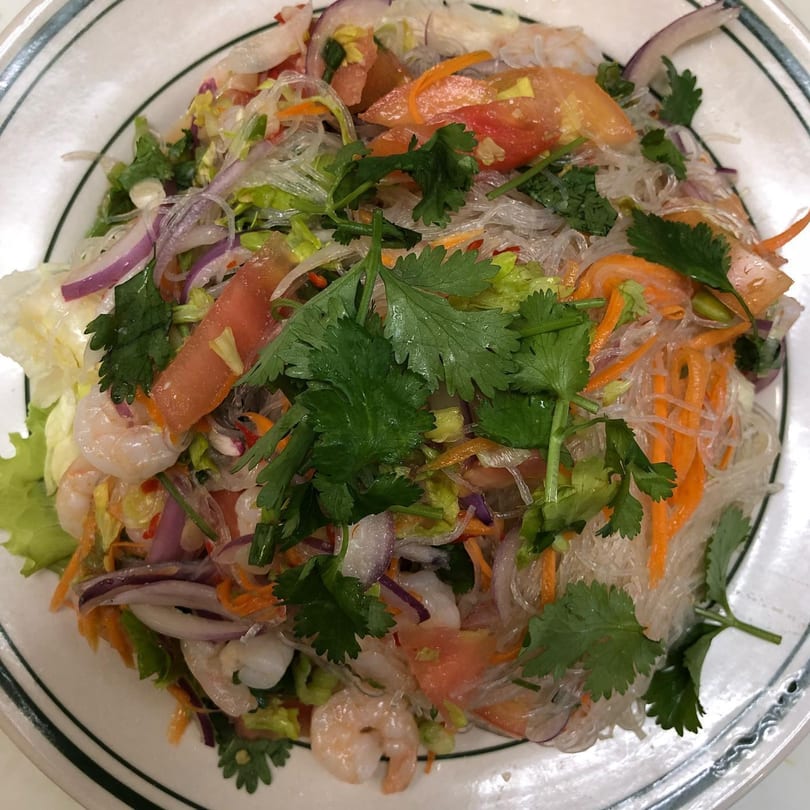 Asian Express glass noodle salad with shrimp, tomatoes, onions, carrots, and cilantro.